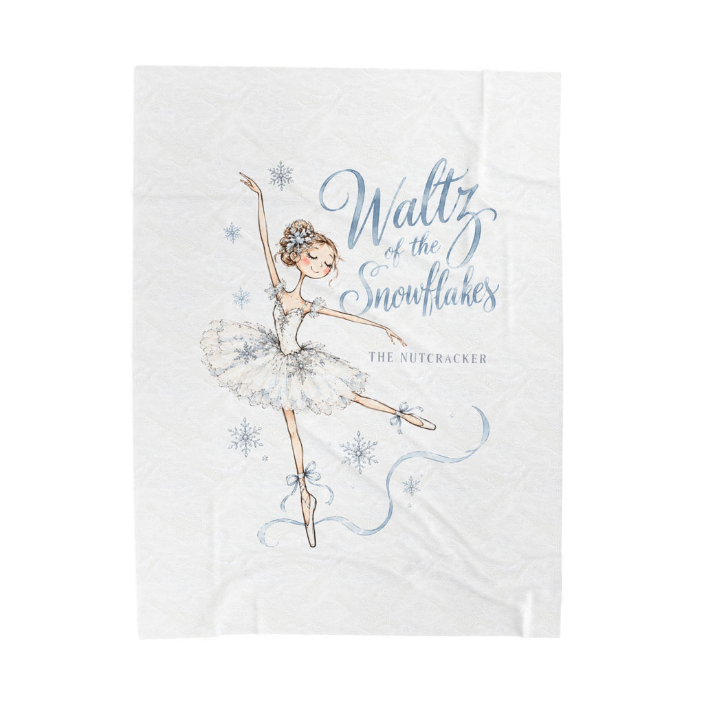 A white kitchen towel featuring an illustration of a ballerina in a tutu with the text 'Waltz of the Snowflakes' and 'THE NUTCRACKER' printed in blue and gray.