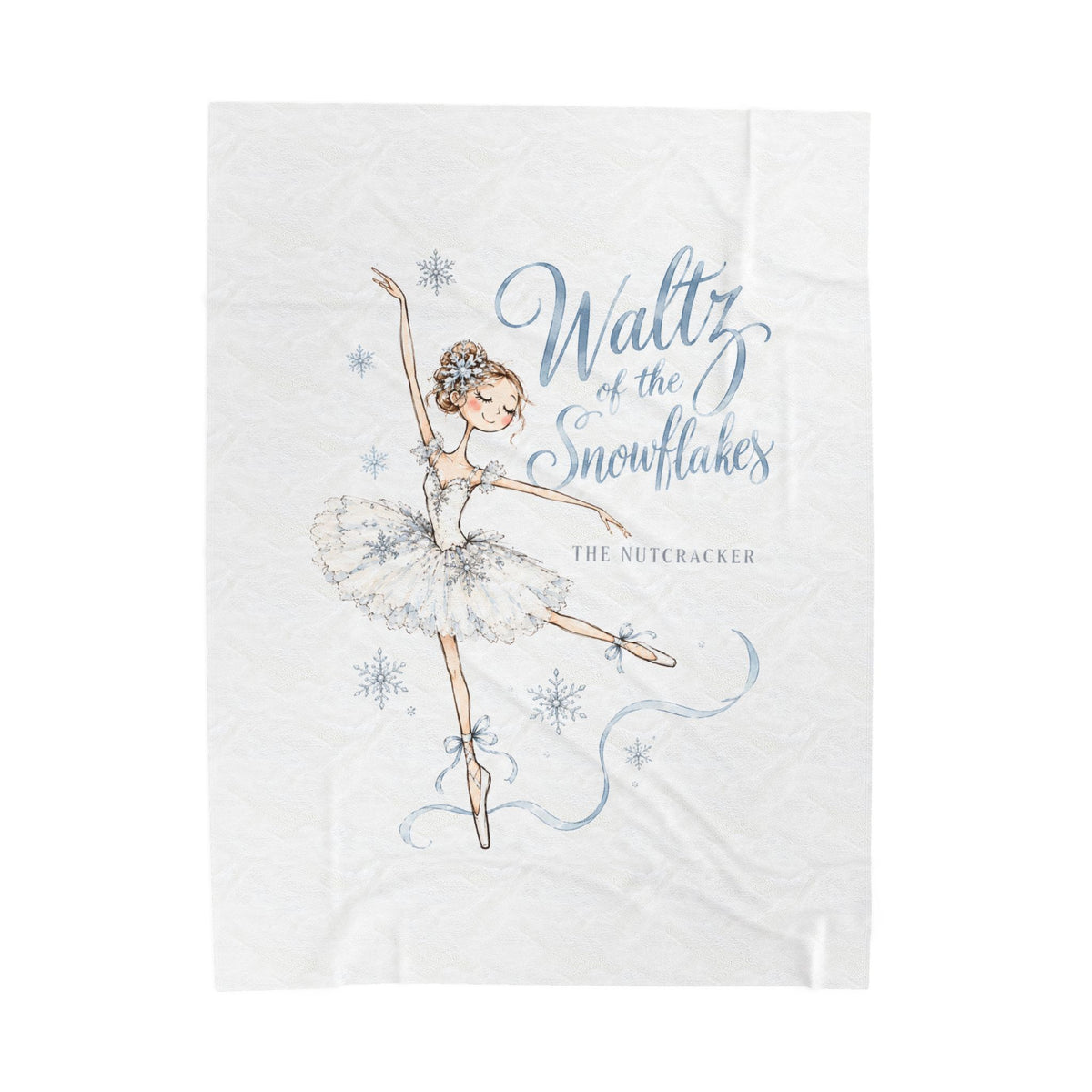 A white kitchen towel featuring an illustration of a ballerina in a tutu with the text 'Waltz of the Snowflakes' and 'THE NUTCRACKER' printed in blue and gray.