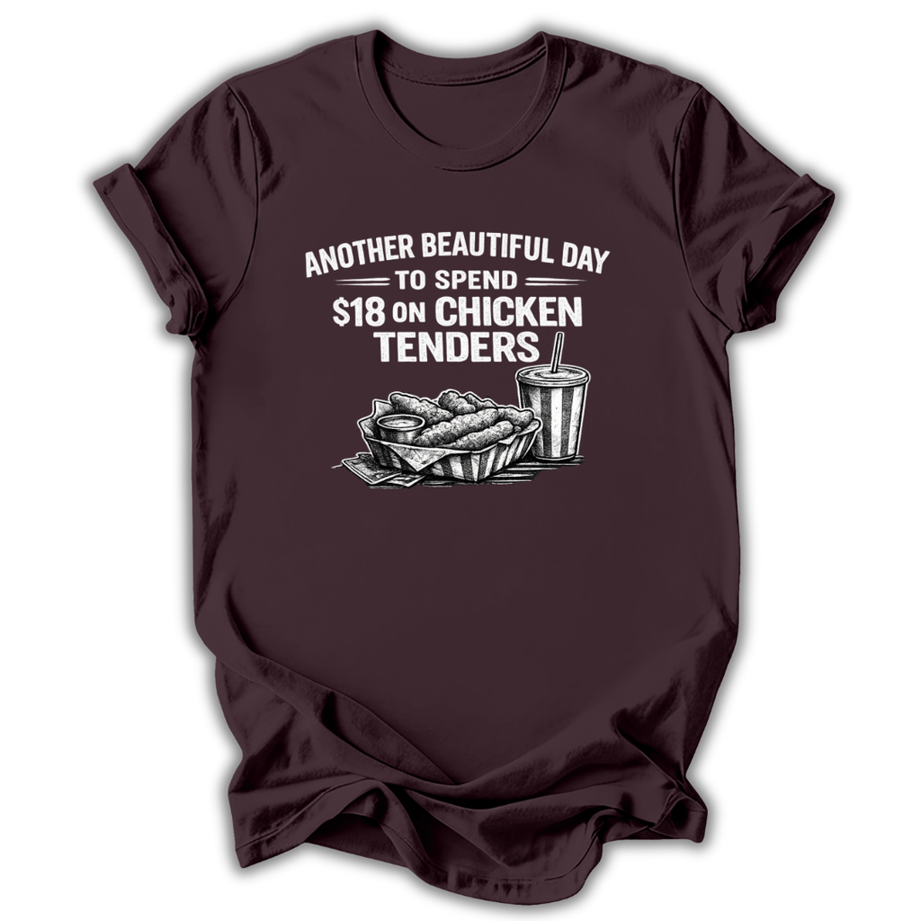 Brown t-shirt with graphic of chicken tenders and a drink, text 'Another Beautiful Day to Spend $18 on Chicken Tenders' on a white background.
