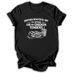 Black t-shirt with graphic of chicken tenders and a drink, text 'Another Beautiful Day to spend $18 on Chicken Tenders' on a white background.