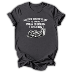 Dark t-shirt with graphic of chicken tenders and a drink, text 'Another Beautiful Day to spend $18 on Chicken Tenders' on a white background.