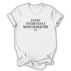 White t-shirt with black text 'Every Studio Has a Main Character' on a white background