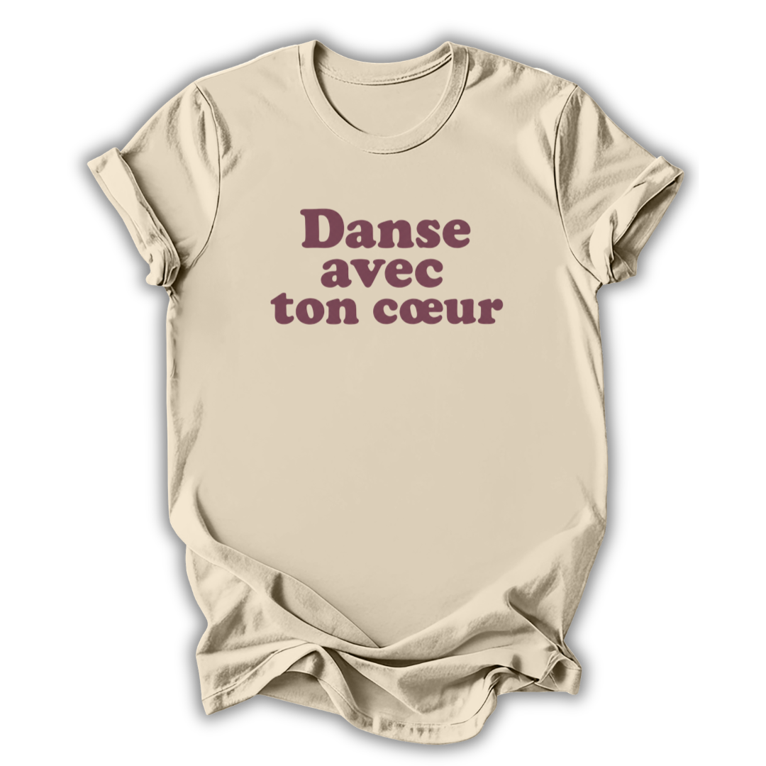 Beige t-shirt with French text 'Danse avec ton coeur' on a white background