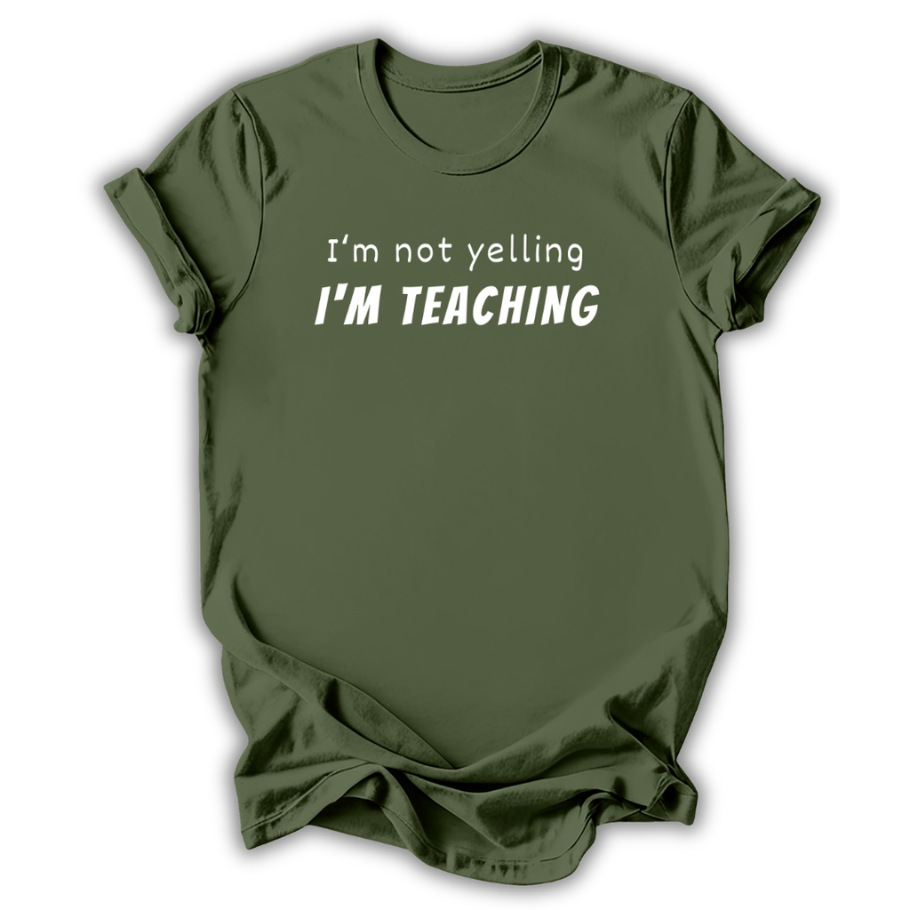 Green  t-shirt with 'I'm not yelling I'm Teaching' text on a white background