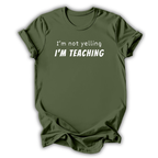Green  t-shirt with 'I'm not yelling I'm Teaching' text on a white background