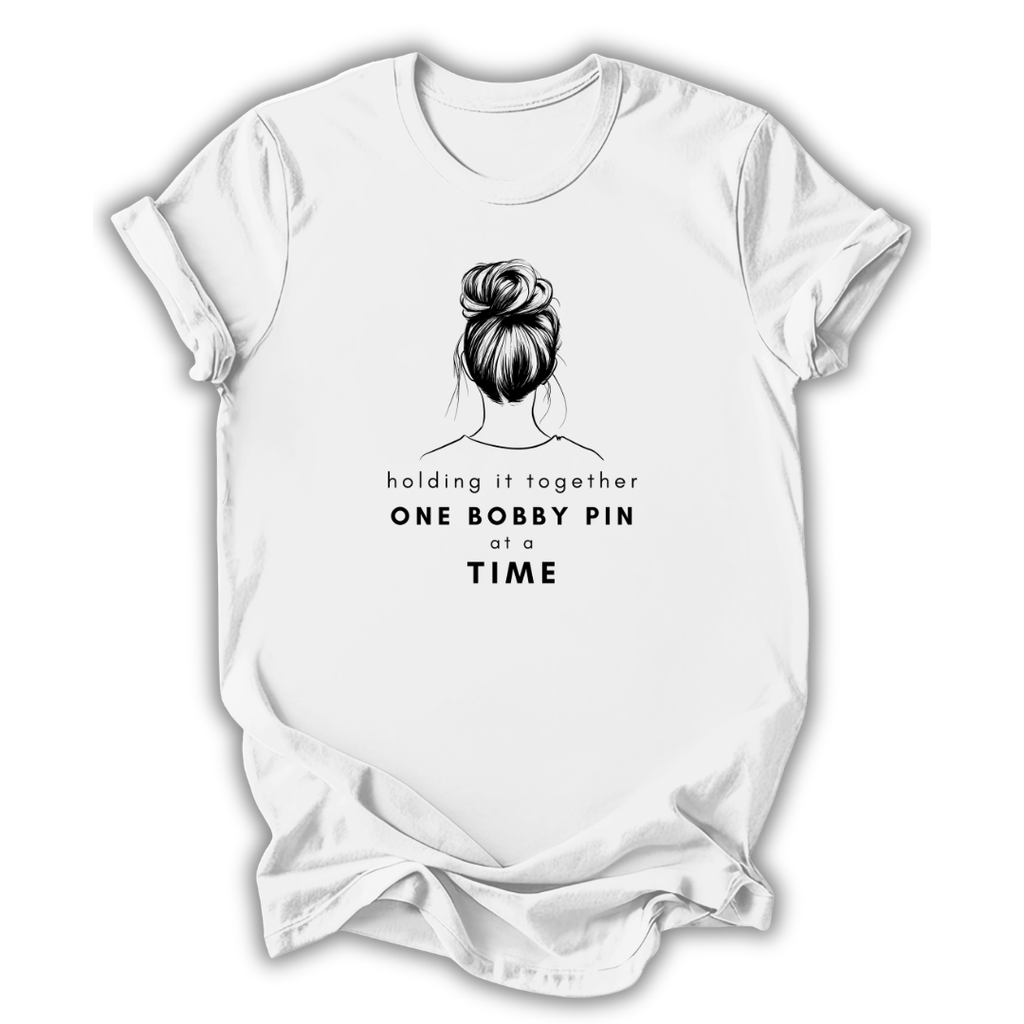 White t-shirt with black graphic and text on a white background