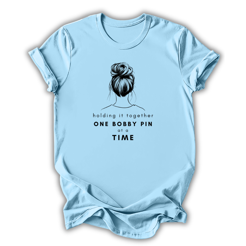 Light blue t-shirt with a graphic of a bun and text on a white background