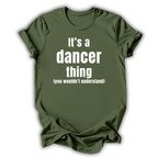 Green t-shirt with white text 'It's a dancer thing (you wouldn't understand)' on a white background