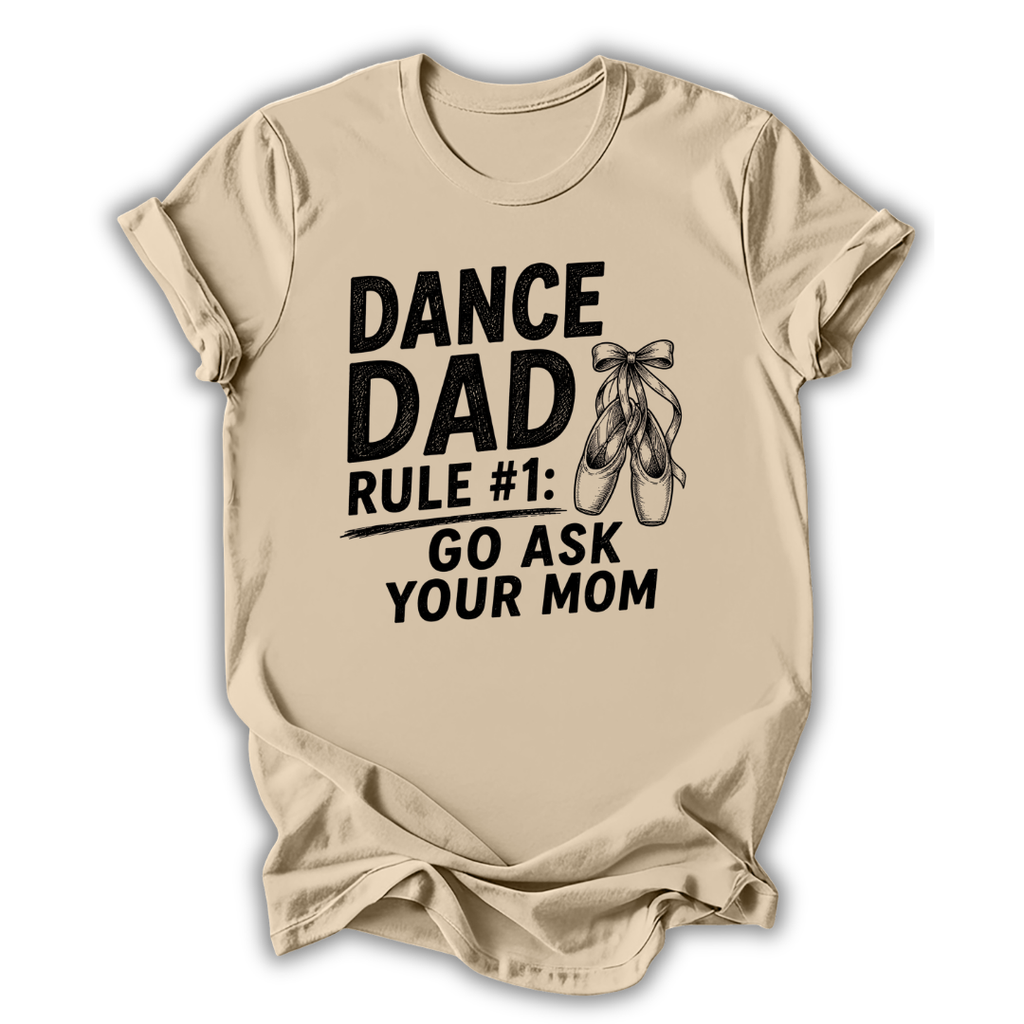 Beige t-shirt with 'Dance Dad' text and ballet shoes graphic on a white background