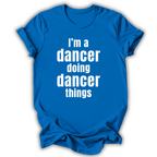 Blue t-shirt with white text 'I'm a dancer doing dancer things' on a white background
