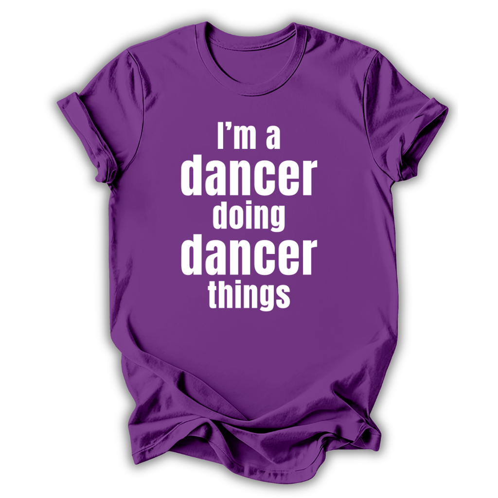 Purple t-shirt with white text 'I'm a dancer doing dancer things' on a white background