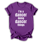 Purple t-shirt with white text 'I'm a dancer doing dancer things' on a white background