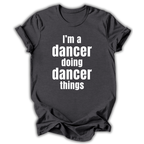 Black t-shirt with white text 'I'm a dancer doing dancer things' on a white background