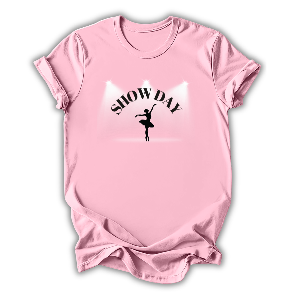 Pink t-shirt with 'SHOW DAY' and a dancer graphic on a white background