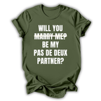 Green t-shirt with white text 'WILL YOU MARRY ME? BE MY PAS DE DEUX PARTNER?' on a white background