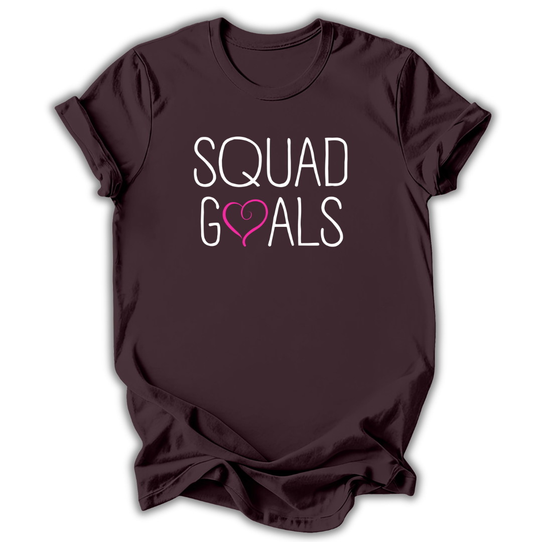 Black t-shirt with graphic design and text 'standing in the spotlight' on a white background