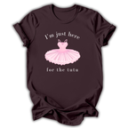 Brown t-shirt with pink ballet tutu graphic and text on a white background