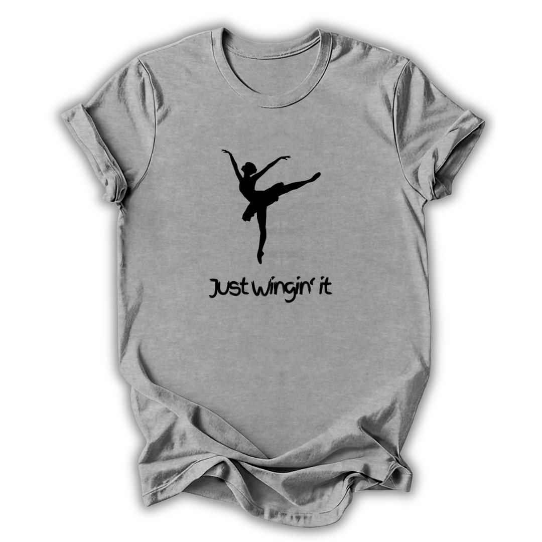 Gray t-shirt with a black silhouette of a dancer and 'Just wingin' it' text on a white background