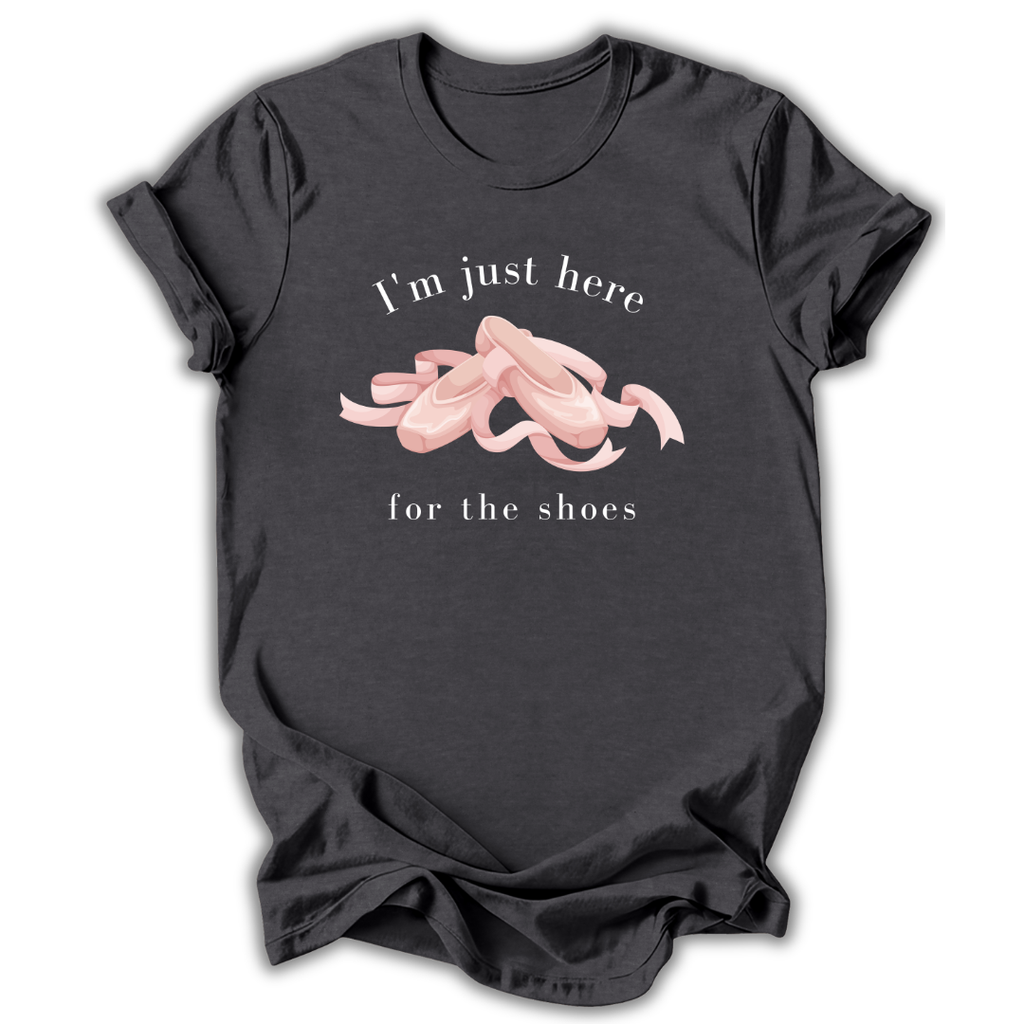 Black t-shirt with pink shoes graphic and text on a white background