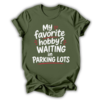 Green t-shirt with humorous text design on a white background