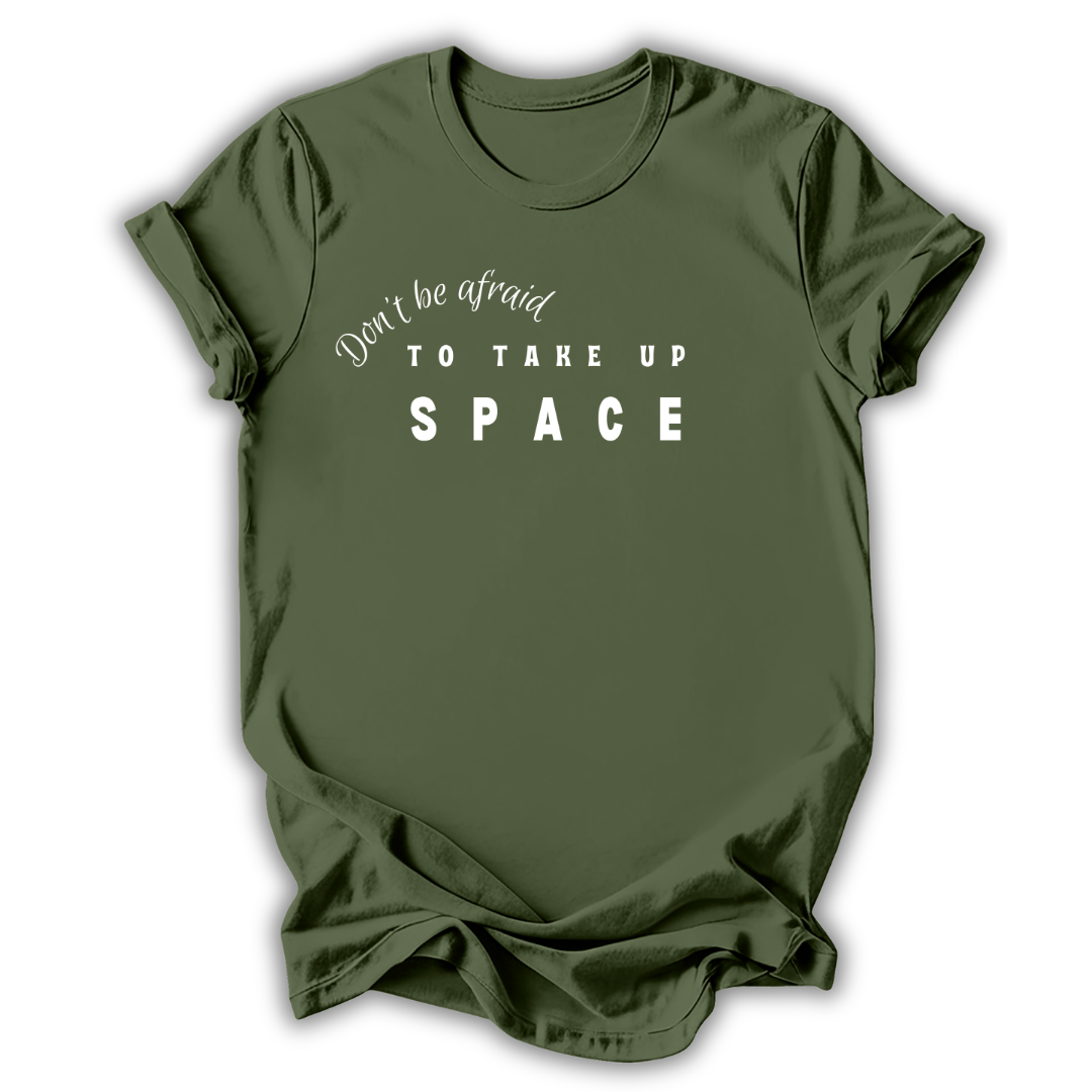 Green t-shirt with motivational quote on a white background