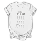 White t-shirt with black text and graphics on a white background