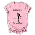 Pink t-shirt with a graphic of a dancer and text 'Don't follow me, I'm lost too' on a white background