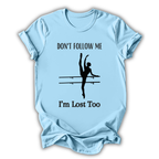Light blue t-shirt with a graphic of a dancer and text 'Don't follow me, I'm lost too' on a white background