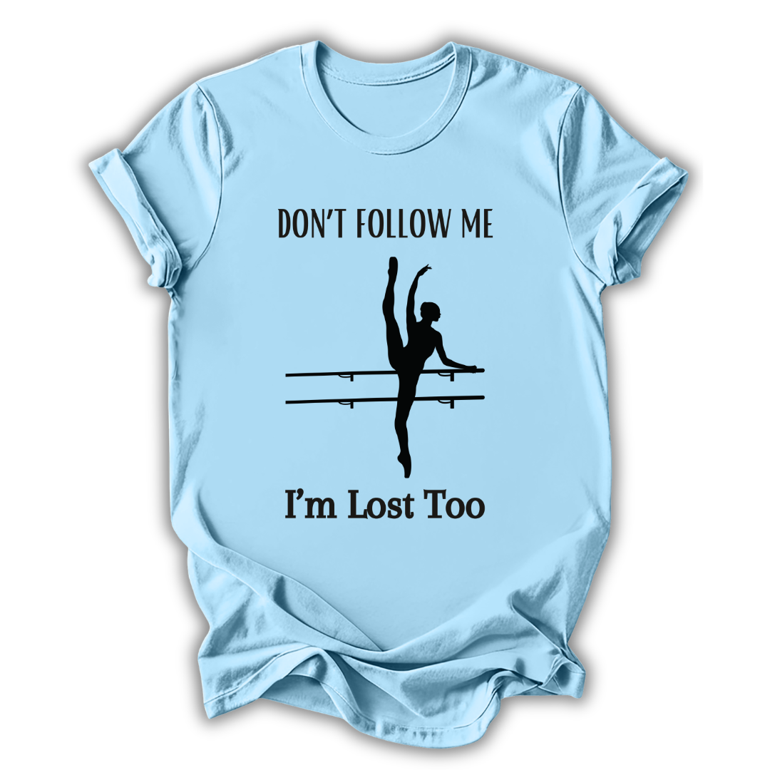 Light blue t-shirt with a graphic of a dancer and text 'Don't follow me, I'm lost too' on a white background