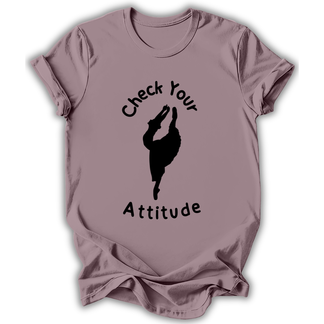 Mauve t-shirt with 'Check Your Attitude' text and graphic on a white background