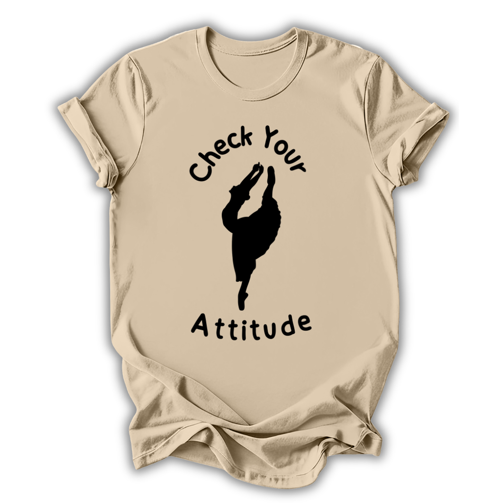 Beige t-shirt with 'Check Your Attitude' text and graphic on a white background