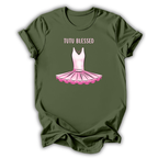 Green t-shirt with pink tutu graphic and 'Tutu Blessed' text on a white background
