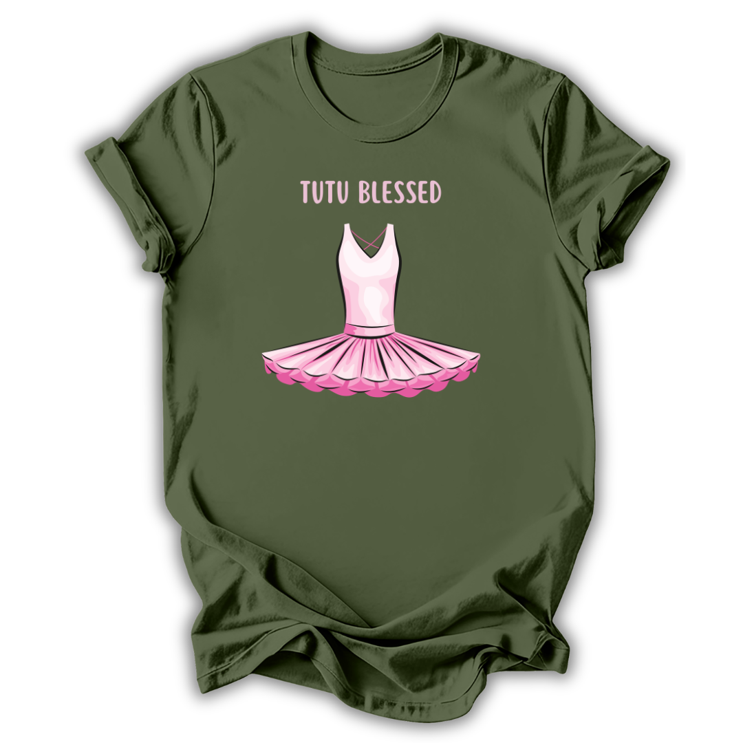 Green t-shirt with pink tutu graphic and 'Tutu Blessed' text on a white background