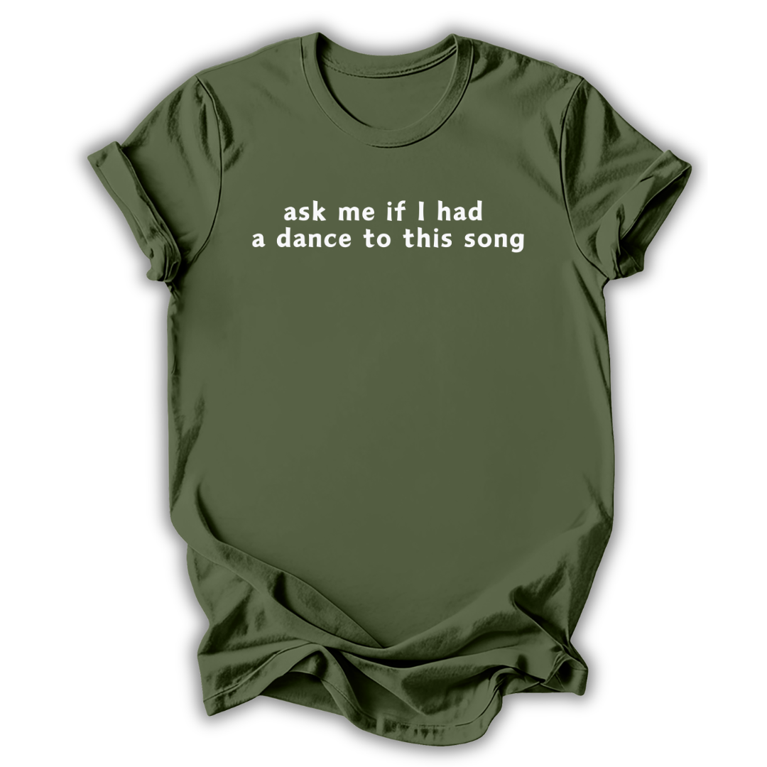 Green t-shirt with 'Toi Toi Toi' text on a white background