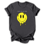 Gray -shirt with yellow smiley face graphic and text 'I can't feel my toes' on a white background