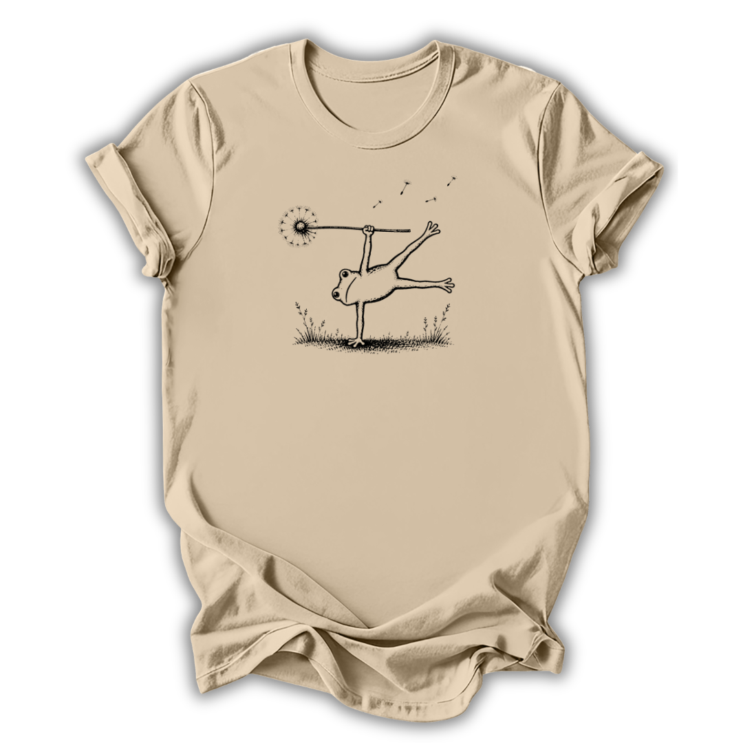 Beige t-shirt with a graphic design of a person balancing on a seesaw.
