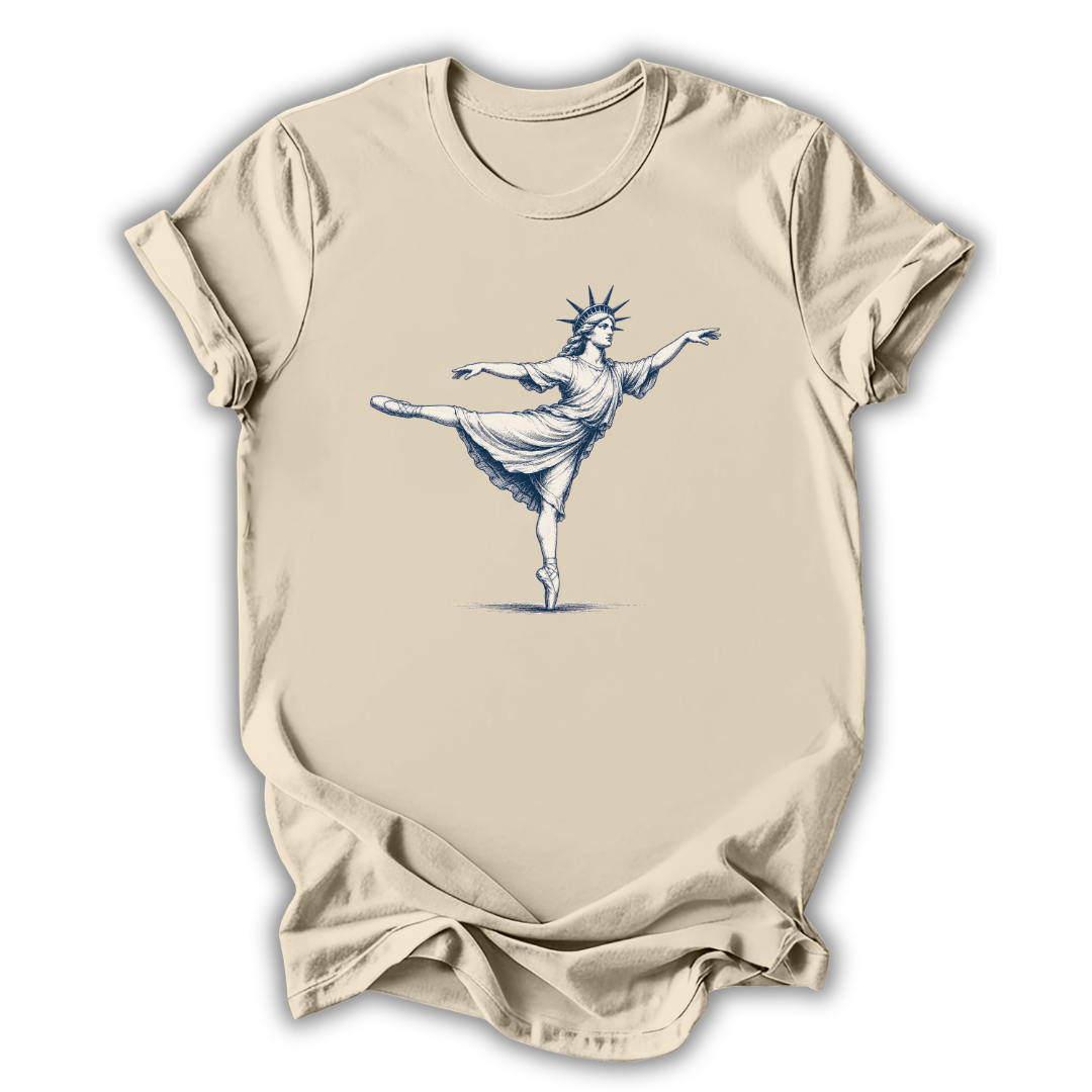 Beige t-shirt with a graphic of the Statue of Liberty dancing on a white background