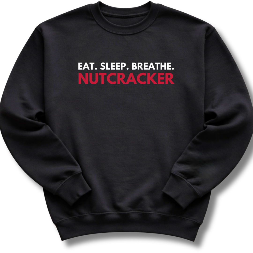 Black sweatshirt with 'Eat. Sleep. Breathe. Nutcracker' text on a white background