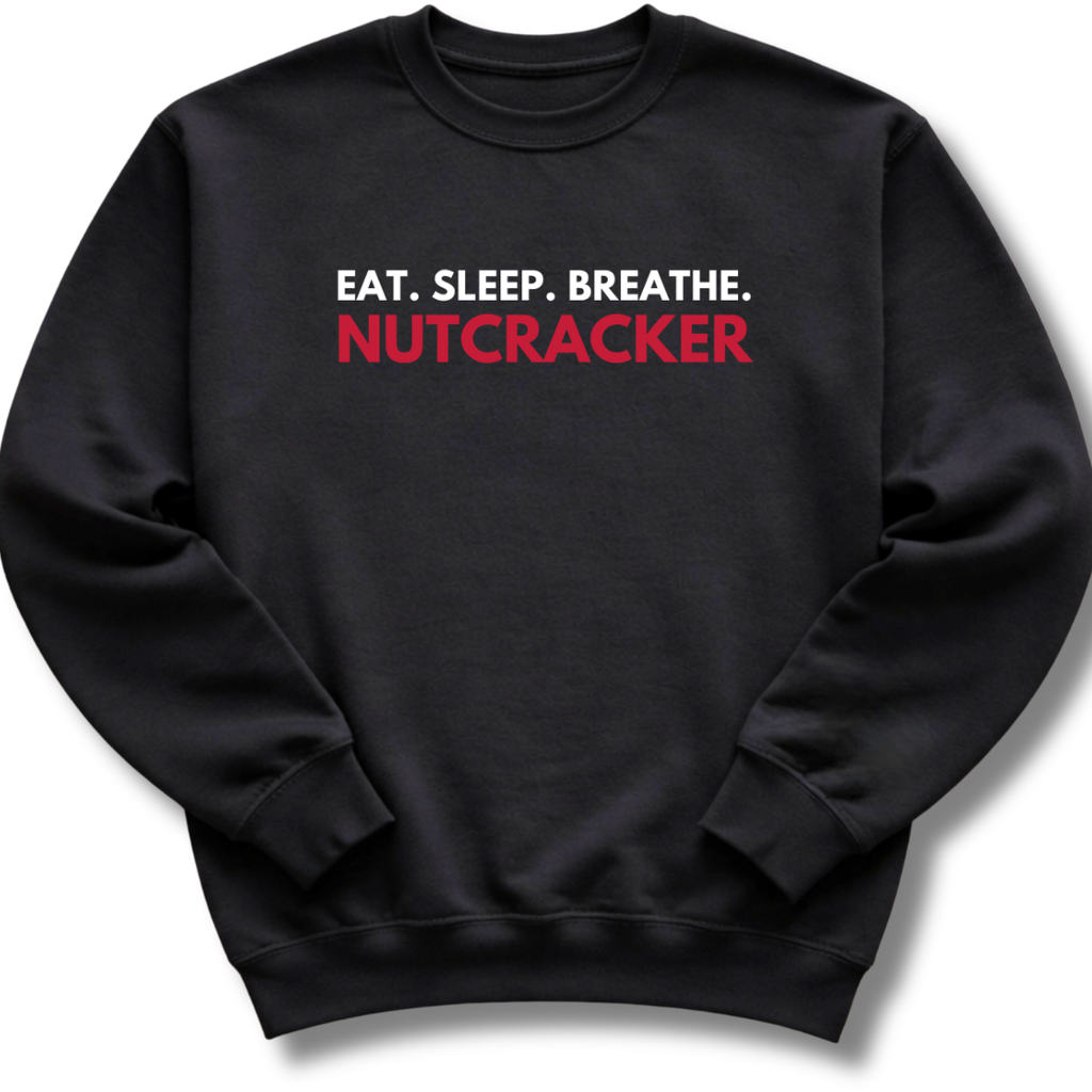 Black sweatshirt with 'Eat. Sleep. Breathe. Nutcracker' text on a white background