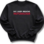 Black sweatshirt with 'Eat. Sleep. Breathe. Nutcracker' text on a white background