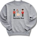 Gray sweatshirt with 'Nutcracker Mom' design featuring characters and text on a white background