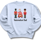 Light blue sweatshirt with Nutcracker-themed design and 'Nutcracker Dad' text on a white background