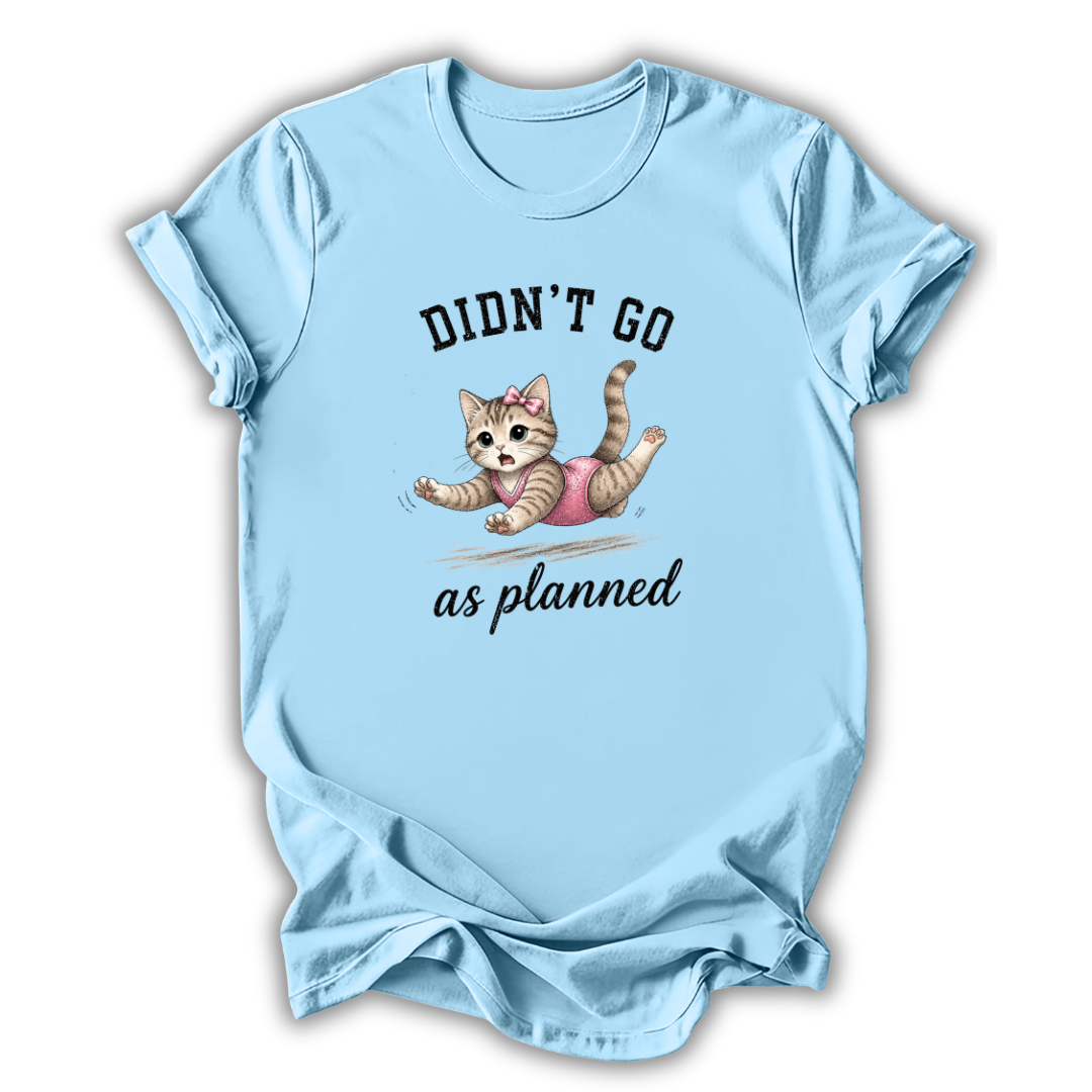 Light blue t-shirt with a graphic of a cat and text 'Didn't go as planned' on a white background