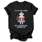 A black short-sleeve t-shirt with a graphic of a mouse dressed as a king in a red robe and blue pants, surrounded by white text that reads 'IT'S ALL FUN & GAMES UNTIL THE MOUSE KING SHOWS UP' on a white background.
