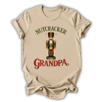 beige nutcracker grandpa t-shirt with a christmas nutcracker on a white background