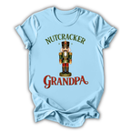 light blue nutcracker grandpa t-shirt with a christmas nutcracker on a white background
