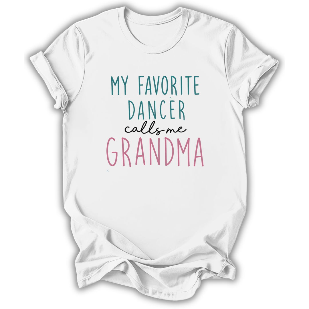 A white short-sleeve crewneck t-shirt with a graphic text print reading 'MY FAVORITE DANCER calls me GRANDMA' in teal, black, and pink lettering, displayed on a clean white background.