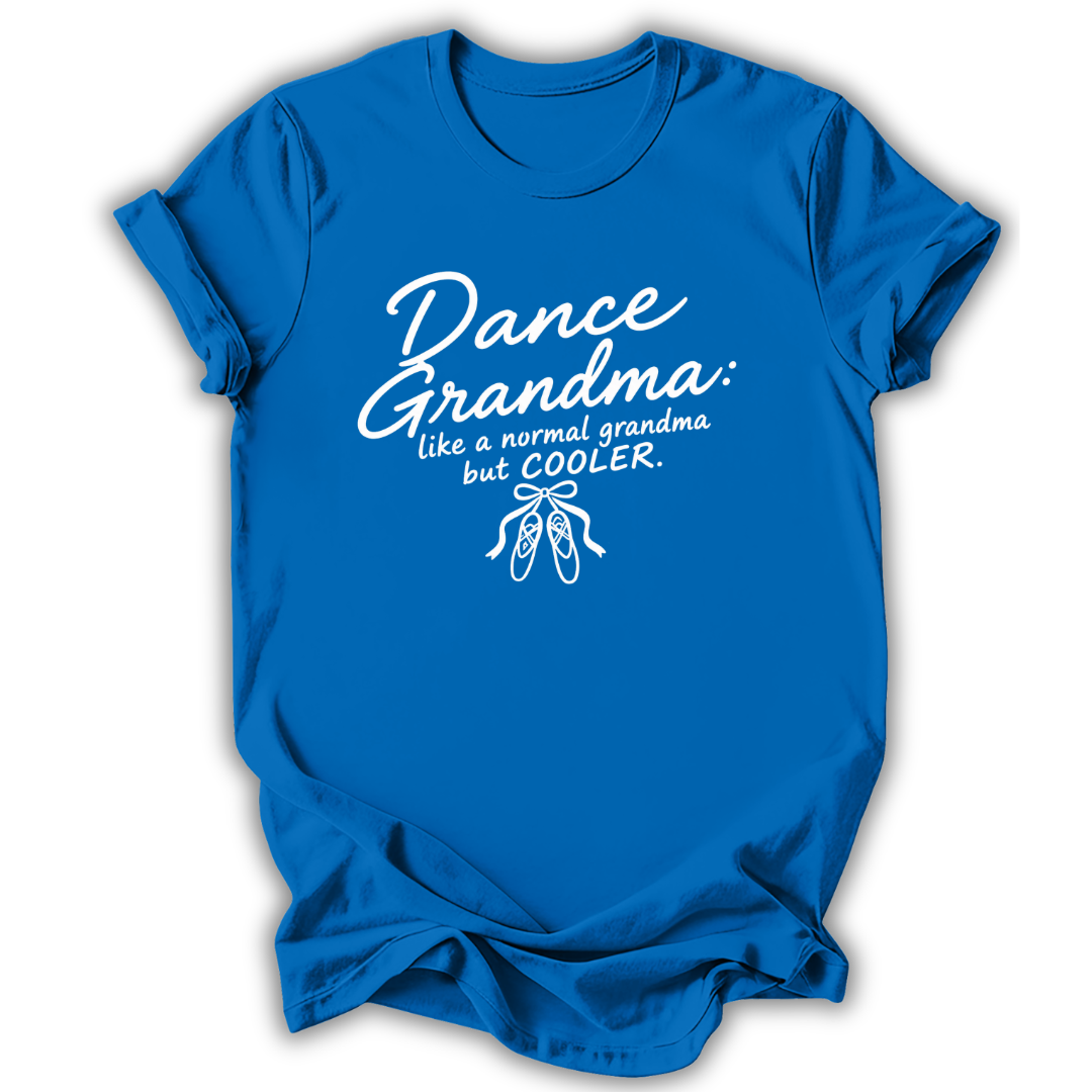 A royal blue short-sleeve t-shirt with a white graphic print that reads 'Dance Grandma: like a normal grandma but COOLER.' above a small ballet shoe illustration, shown on a white background.