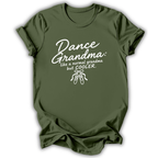 An olive green short-sleeve t-shirt with a white graphic print that reads 'Dance Grandma: like a normal grandma but COOLER.' above a small ballet shoe illustration, shown on a white background.