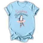 A light blue short-sleeve t-shirt with a graphic of a fish ballerina and the text 'Sardina Ballerina' printed on the front, displayed against a white background.